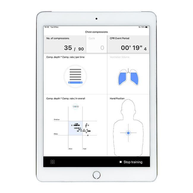 An iPad showing CPR metrics including number of compressions, CPR event period, compression depth, ventilation volume and hand position.